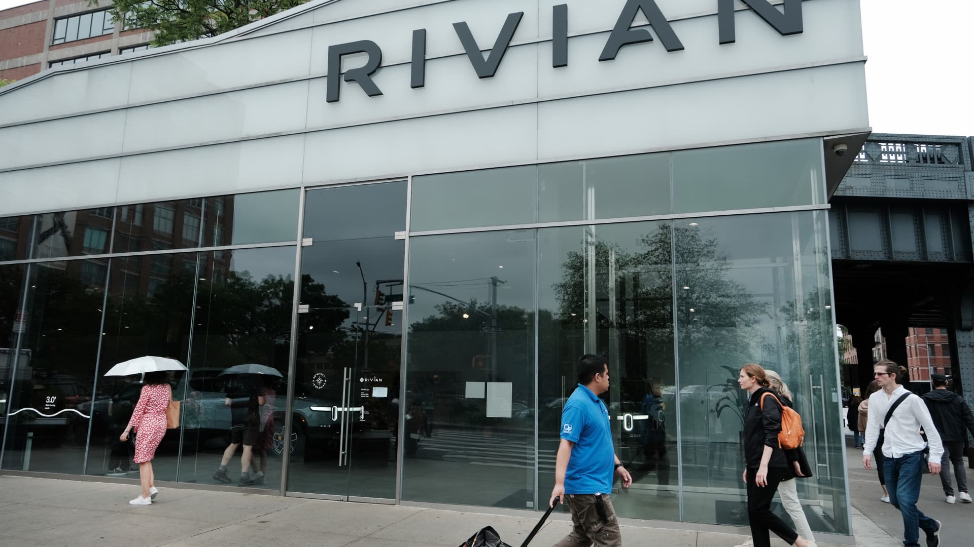 stocks-making-the-biggest-moves-midday:-tesla,-rivian,-xpeng-and-more